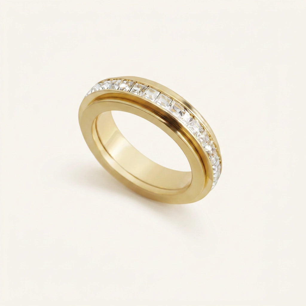 Crystal statement spinning fidget ring — gold variant, crystal-set spinning band