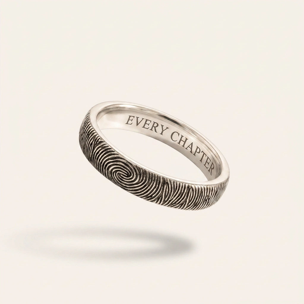 Custom Fingerprint Ring — slim sterling silver band with engraved fingerprint and EVERY CHAPTER inside, hero