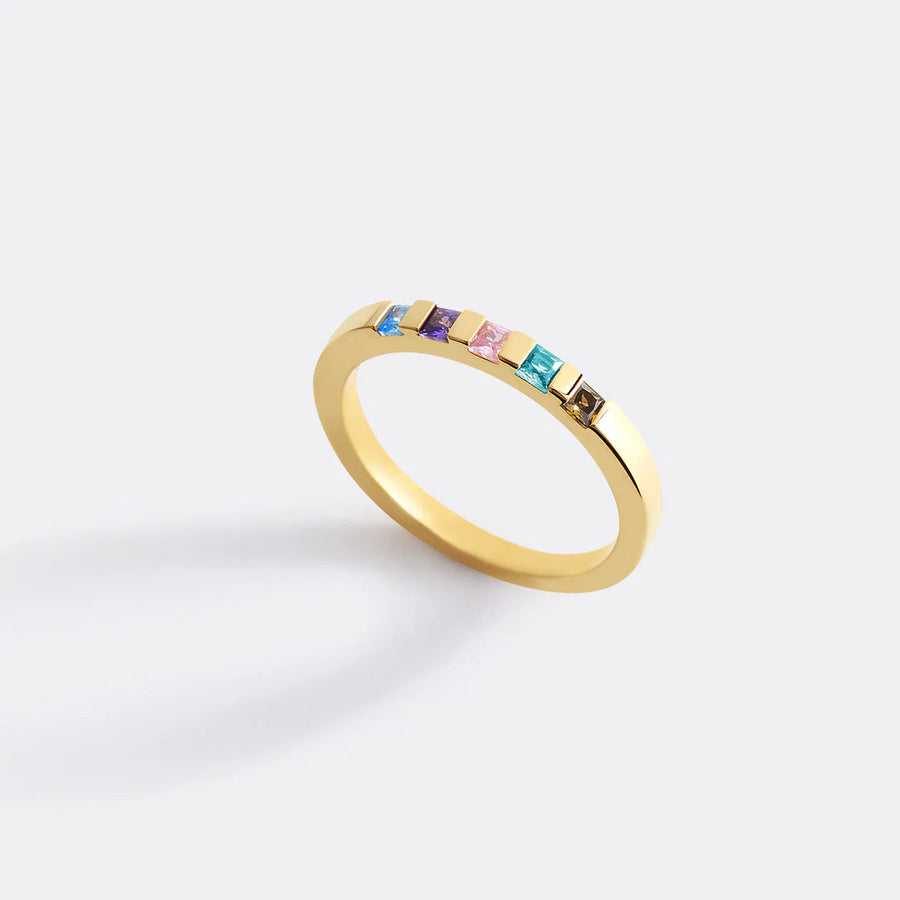 Princess-cut birthstone band ring — gold ecomm hero