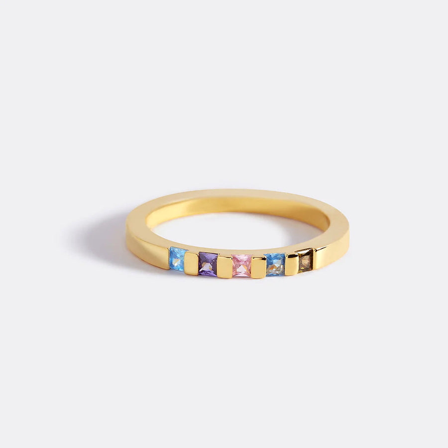 Princess-cut birthstone band ring — gold 3/4 view with colored stones