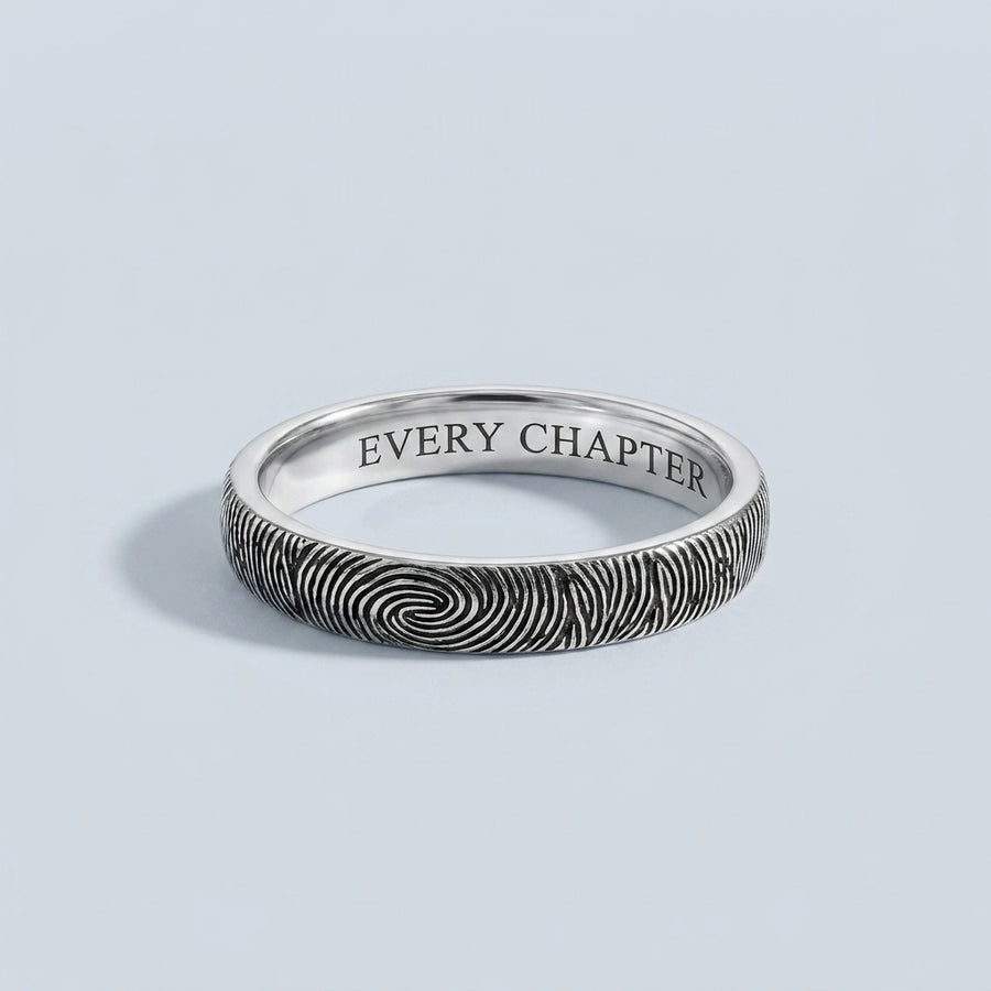 Custom Fingerprint Ring — slim sterling silver band with engraved fingerprint and EVERY CHAPTER inside, hero