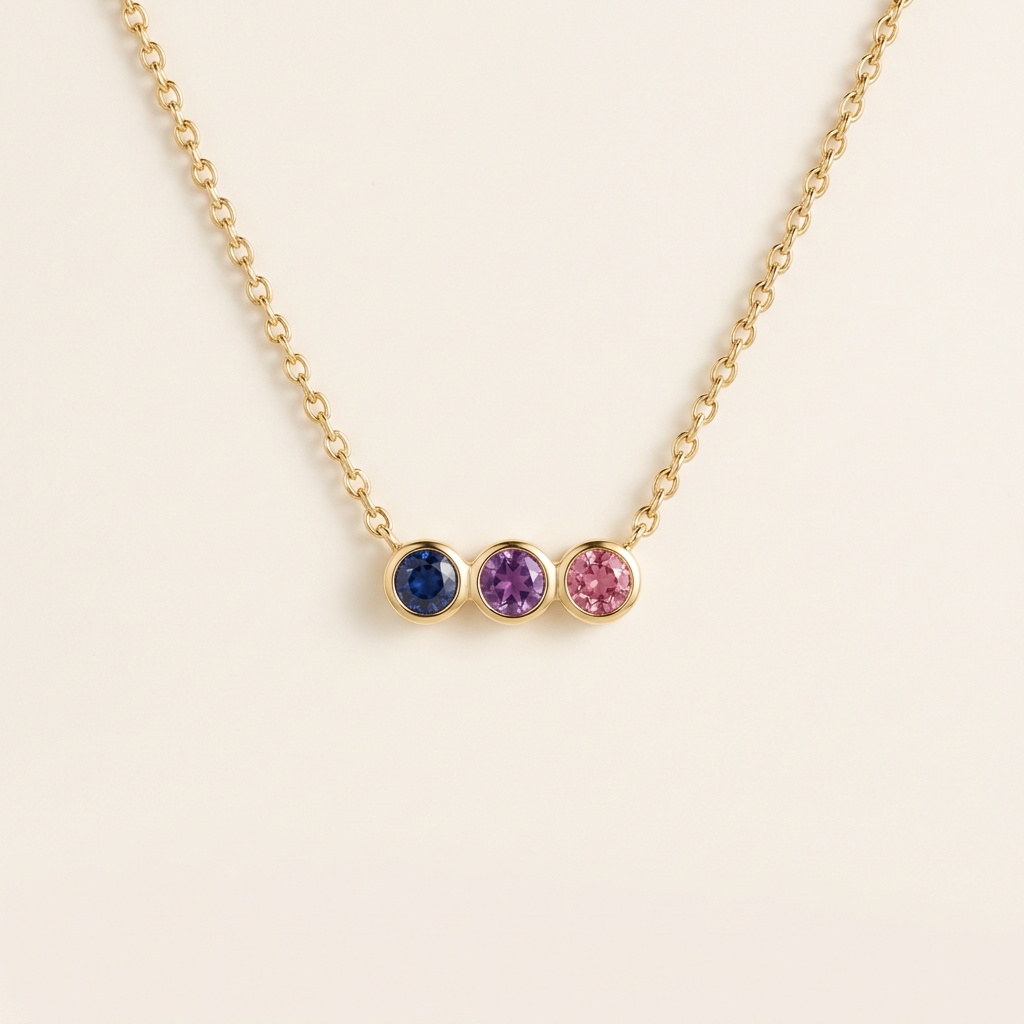 Dainty Family Birthstones Necklace — 3 fused bezels touching, sapphire purple pink, cream ivory background hero