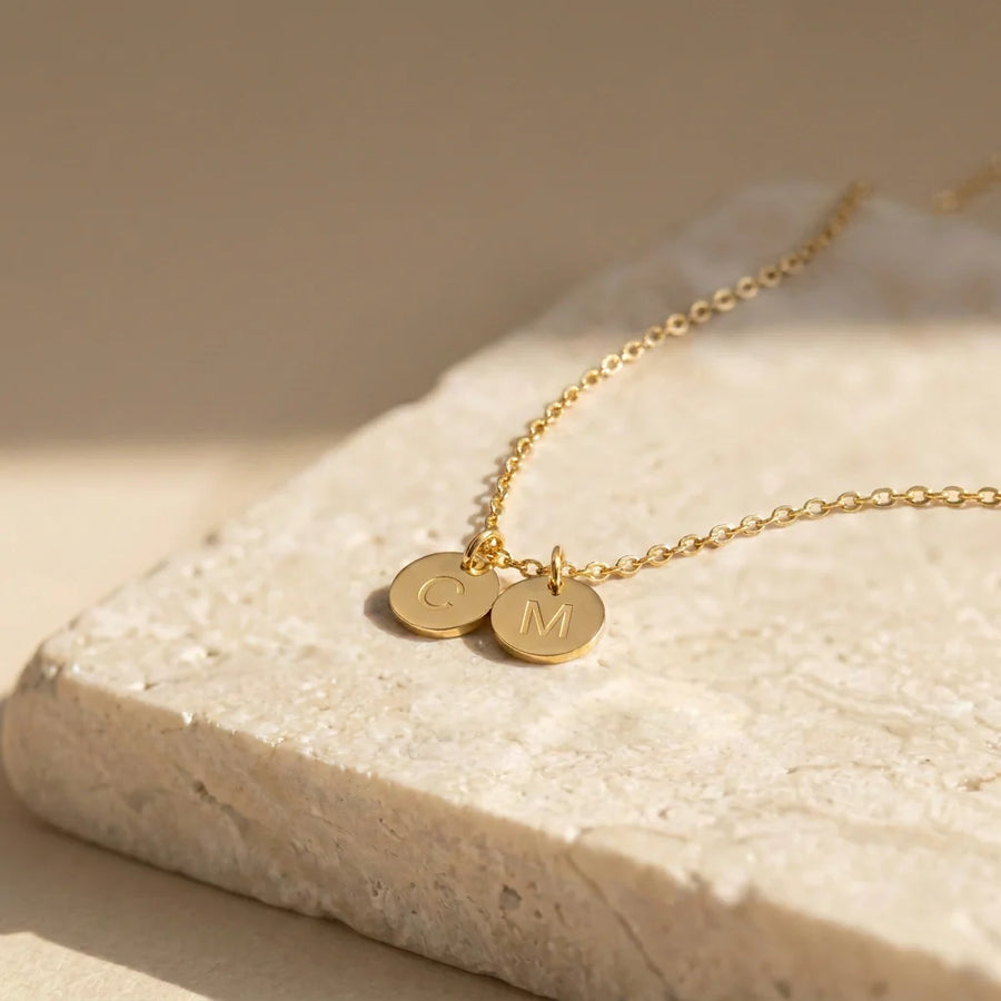 Dainty Disc Initial Necklace on stone