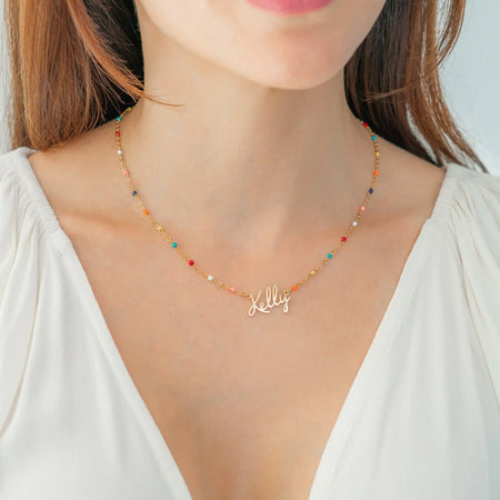 Colorful Beaded Fairy Name Necklace — worn on neckline
