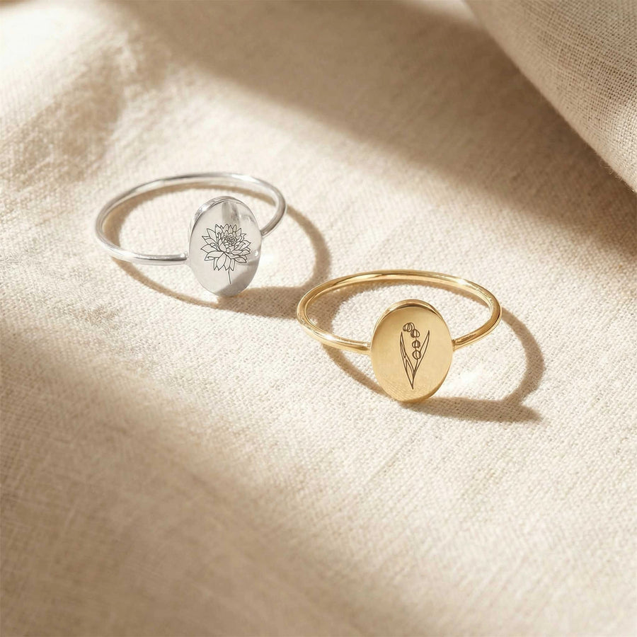 Birth Flower Engraved Ring – Silver + Gold pair on linen
