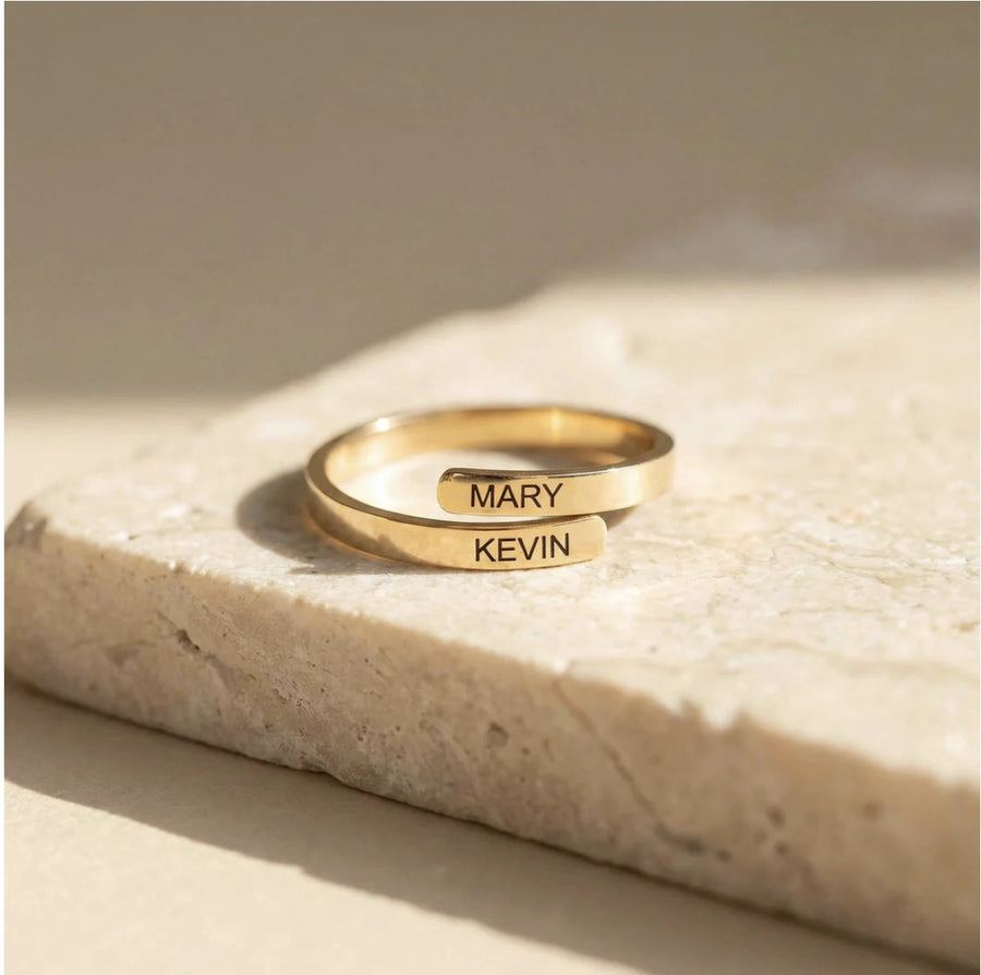 Two-Name Wrap Ring in gold on stone, engraved MARY and KEVIN