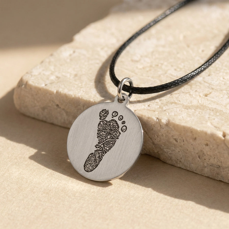 Peaceful Stainless Print Keepsake – posed on stone